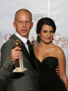 Ryan Murphy poses with Lea Michele and his trophy for Best Television Series-Comedy or Musical for ‘Glee’ in the photo room at the 67th Annual Golden Globe Awards at the Beverly Hilton Hotel in Beverly Hills, California, January 17, 2010