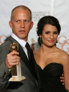Ryan Murphy poses with Lea Michele and his trophy for Best Television Series-Comedy or Musical for ‘Glee’ in the photo room at the 67th Annual Golden Globe Awards at the Beverly Hilton Hotel in Beverly Hills, California, January 17, 2010