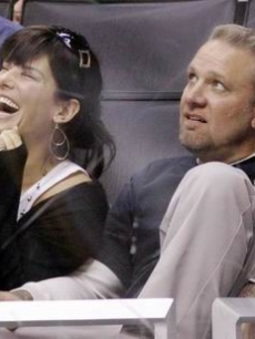 Sandra Bullock & hubbie Jesse watch the Kings vs. Ducks hockey game