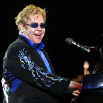 Elton John smiles from the stage at the Rock in Rio Festival in Lisbon, Portugal, on May 22, 2010
