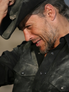 Max Ryan tips his cowboy hat