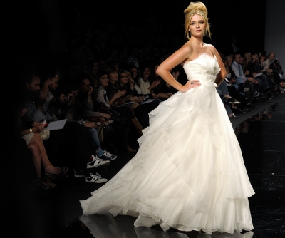 Mischa Barton shows off a creation from Rosa Clara’s latest bridal collection in Barcelona, Spain, May 18, 2010