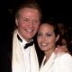 Jon Voight and daughter Angelina Jolie cuddle up at the Vanity Fair Oscar Party, March 25, 2010
