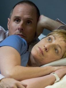 Edie Falco as Nurse Jackie Peyton and Paul Schulze as pharmacist Eddie get close on Showtime’s ‘Nurse Jackie,’ Season 1