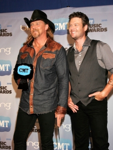 Trace Adkins and Blake Shelton, winners of Collaborative Video of the Year, pose with their trophy in the CMT Music Awards press room at the Bridgestone Arena on June 9, 2010 in Nashville, Tennessee
