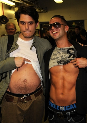 John Mayer and ‘Jersey Shore’s’ Mike ‘The Situation’ Sorrentino compare abs at the 2010 CMT Music Awards at the Bridgestone Arena in Nashville, Tennessee on June 9, 2010