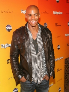 Mehcad Brooks smiles for photographers at ABC’s “My Generation” Rock the Roof event hosted by Rolling Stone Magazine at the Andaz Hotel in West Hollywood, Calif., on June 23, 2010