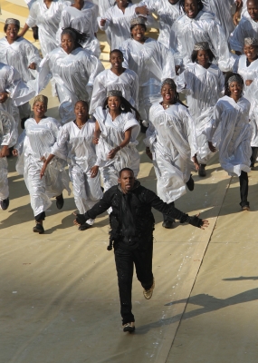R Kelly performs with the Soweto Spiritual singers at the Opening Ceremony of the FIFA World Cup at Soccer City Stadium in Johannesburg, South Africa on June 11, 2010