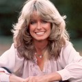 Farrah Fawcett poses for a publicity photo in the outdoors, 1975
