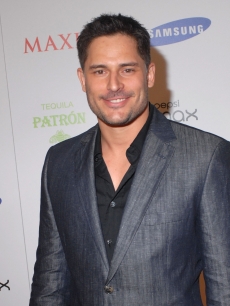Joe Manganiello smiles for the camera at The Maxim Party hosted by Samsung, Patron, Gillette & Pepsi Max at The Ritz Ybor in Tampa, Florida on January 30, 2009