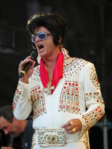 Bill Murray channels Elvis Presley onstage as he hosts the Crossroads Guitar Festival at Toyota Park in Bridgeview, Ill., on June 26, 20100