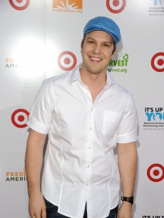 Gavin DeGraw smiles for the camera on the red carpet at the ‘Party for Good - Making Meals to Feed Young Minds’ event at Basketball City - Pier 36 - South Street in New York City on June 29, 2010