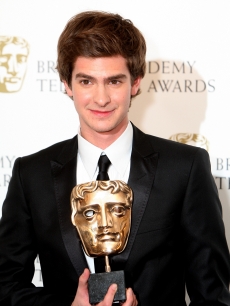 Andrew Garfield poses in front of the winners boards with the Best Actor Award at the British Academy Television Awards 2008 supported by Sky+ at the Palladium, London, April 20, 2008