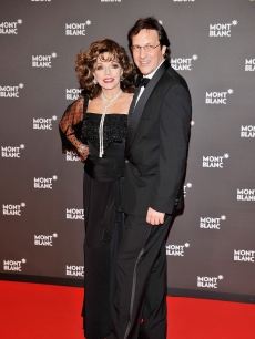 Joan Collins and husband Percy Gibson attend the “Writing Time”, Robert Wilson’s watch launch gala at the Geneva Palaexpo in Geneva, Switzerland on April 9, 2008