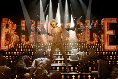 Christina Aguilera goes gold and glamorous in her new film “Burlesque”