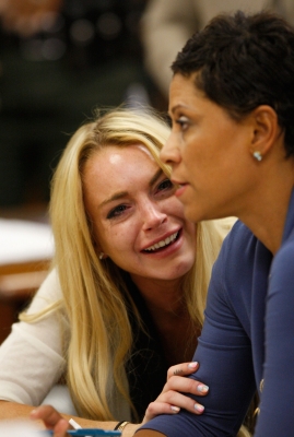 Lindsay Lohan breaks down in tears as she is sentenced to 90 days in jail at her probation revocation hearing at the Beverly Hills Courthouse in Los Angeles, Calif., on July 6, 2010
