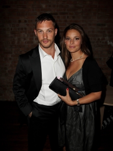 Tom Hardy and guest arrives at the UK premiere after party of “RocknRolla” in London, England on September 1, 2008 
