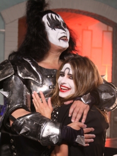 KISS front man Gene Simmons poses with Access’ Maria Menounos on the set of Access Hollywood in Burbank, Calif., on July 19, 2010