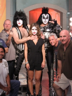 KISS rock stars Gene Simmons and Paul Stanley pose with the Access Hollywood team on the set of Access Hollywood in Burbank, Calif., on July 19, 2010