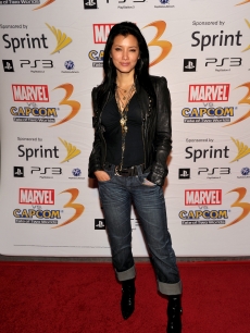 “The Scorpion King” Sorceress Kelly Hu poses for the cameras at the Marvel Vs. Capcom party during Comic-Con International at the Hard Rock Hotel in San Diego, Calif., on July 22, 2010