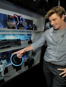 Garrett Hedlund visits Disney’s “Tron: Legacy” booth during Comic-Con International at the San Diego Convention Center in San Diego, Calif., on July 23, 2010 