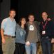 Aaron Eckhart, Michelle Rodriguez, director Jonathan Liebesman and producer Neal Moritz pose together on stage at the “Battle: Los Angeles” panel at Comic-Con International at the San Diego Convention Center in San Diego, Calif., on July 22, 2010