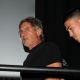 Harrison Ford (in handcuffs) walks onstage at the ‘Cowboys & Aliens’ panel discussion during Comic-Con 2010 at the San Diego Convention Center, SD, July 24, 2010