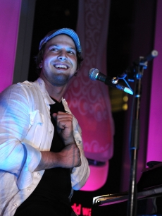 Musician Gavin DeGraw sings on stage at the Schick Intuition Kiss & Tell summer party at Stone Rose at the Time Warner Center in New York City on August 5, 2010