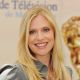 Emily Procter poses at a photocall for “CSI: Miami” during the 2009 Monte Carlo Television Festival held at Grimaldi Forum, Monte Carlo, June 11, 2009