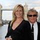Rod Stewart and Penny Lancaster arrive for the Busking Cancer Launch Gig on the HMS Belfast in London on June 20, 2009 