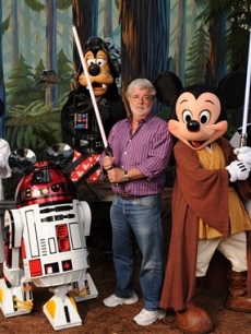 Star Wars creator and filmmaker George Lucas meets a group of Star Wars-inspired Disney characters at Disney’s Hollywood Studios theme park in Lake Buena Vista, Fla., on August 14