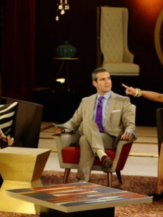 Teresa Giudice screams at Danielle Staub as Andy Cohen looks on during “The Real Housewives of New Jersey” reunion special, Aug. 2010
