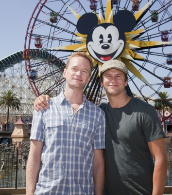 Soon-to-be parents Neil Patrick Harris and David Burtka pose at Paradise Pier at Disney’s California Adventure in Anaheim, Calif., Aug. 14, 2010