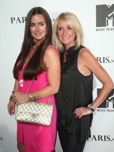Kyle Richards and Kim Richards arrive at a screening of “Paris, Not France” documentary at The Majestic Crest in Los Angeles on July 22, 2009 