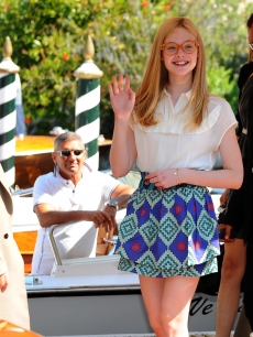 Elle Fanning boards a boat during the 67th Venice Film Festival in Venice, Italy, on September 4, 2010