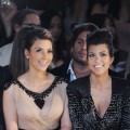 Kim Kardashian and Kourtney Kardashian attend the Jill Stuart Spring 2011 fashion show during Mercedes-Benz Fashion Week at David Koch Theatre at Lincoln Center in New York City on September 11, 2010  