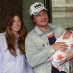 Jamie Oliver, Jools Oliver and the couple’s newborn baby son, Buddy, leave Portland Hospital in London on September 16, 2010 