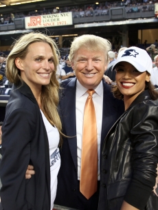 Molly Sims, Donald Trump and Selita Ebanks pose together at Starter Day at Yankee Stadium, NYC, September 23, 2010