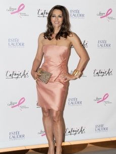 Elizabeth Hurley poses in Paris, upon her arrival to attend an auction of Evelyn H. Lauder’s photographs on June 1, 2010 