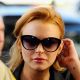 Lindsay Lohan escorted by Los Angeles County Sheriff Deputies arrives for a mandatory court appearance on September 24 in Beverly Hills