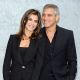 Elisabetta Canalis and George Clooney attend the Giorgio Armani Spring/Summer 2011 fashion show during Milan Fashion Week Womenswear in Milan, Italy on September 27, 2010 