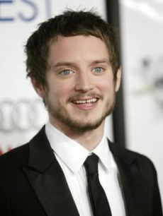Elijah Wood poses for the LA press