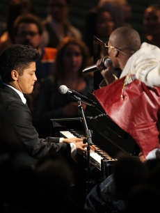 Bruno Mars and rapper B.o.B perform onstage during the 2010 MTV Video Music Awards at NOKIA Theatre L.A. LIVE in Los Angeles on September 12, 2010 