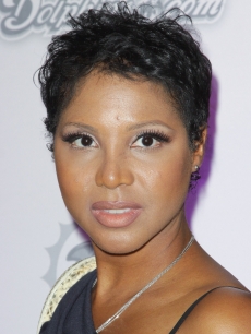 Toni Braxton arrives at the Miami Dolphins versus the New England Patriots game at Sun Life Stadium in Miami, Florida on October 4, 2010 