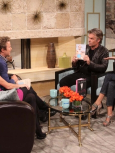 Lisa Rinna and Harry Hamlin pay Billy Bush and Kit Hoover a visit on Access Hollywood Live on October 13, 2010