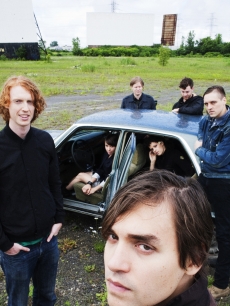 Some of the band members of Arcade Fire in 2010