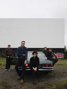Some of the band members of Arcade Fire in 2010