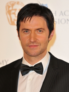 Richard Armitage poses in the press room at the Philips British Academy Television Awards (BAFTA) at London Palladium on June 6, 2010