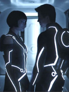 Olivia Wilde and Garrett Hedlund in a scene from “TRON: Legacy”