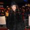 The original “Girl with the Dragon Tattoo,” Noomi Rapace, attends the premiere of “Black Swan,” London, Oct. 22, 2010